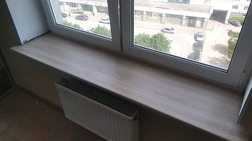 Установка подоконников из ЛДСП в СПб, ул. Кораблестроителей д.34